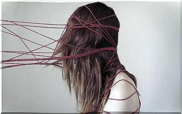 girl caught in threads as an effect of cognitive biases
