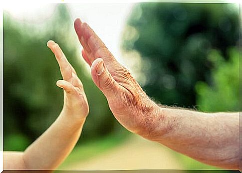 Father and son high-fiving