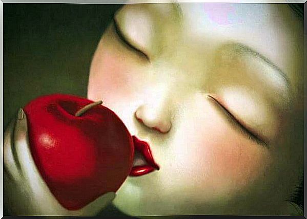 Woman with an apple thinking about love