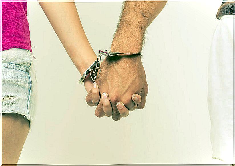 Hands tied with handcuffs