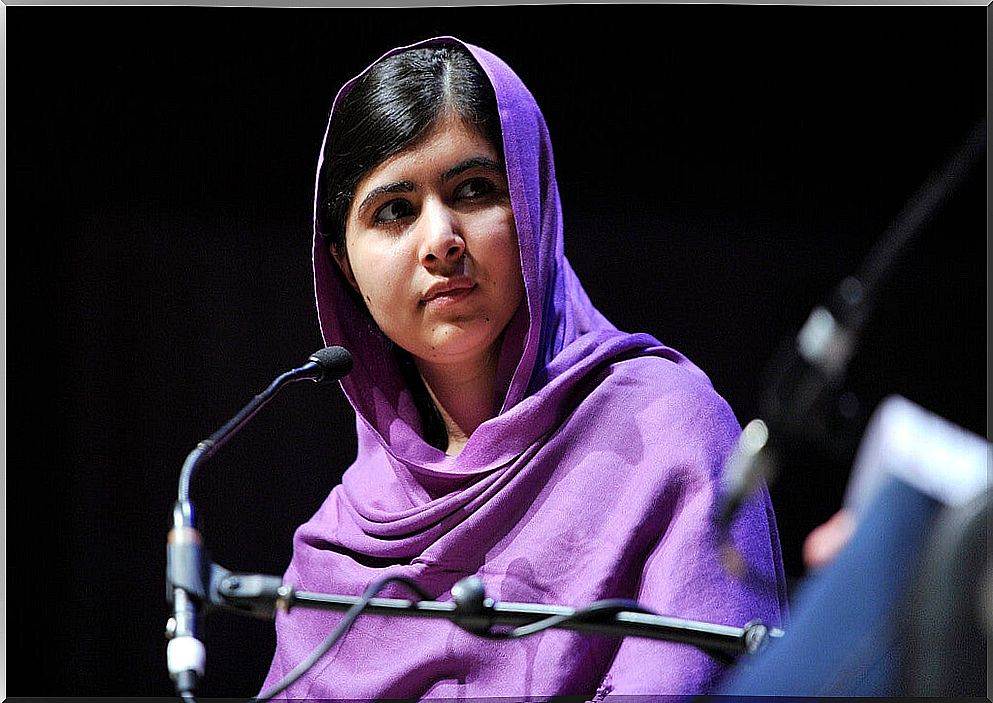 Malala with a microphone