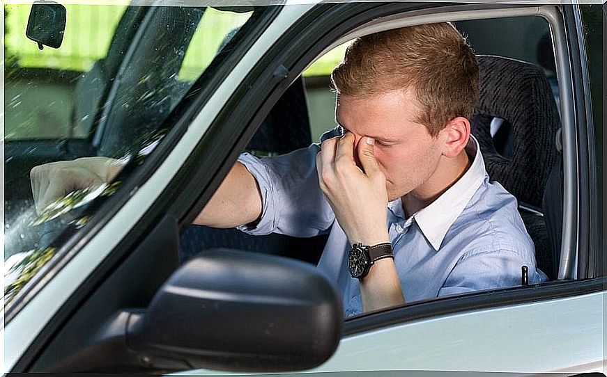 Man in car suffering from narcolepsy