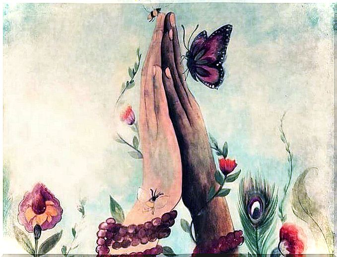 Hands together with a butterfly