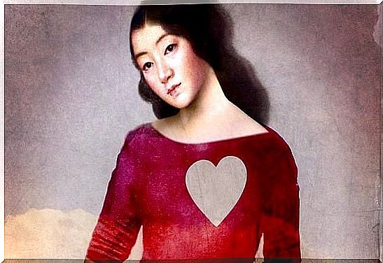 woman with cut out heart