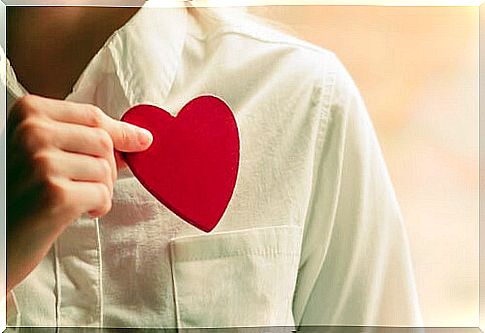 Person keeping a heart in pocket
