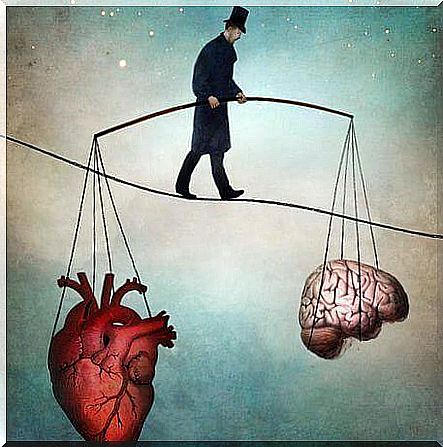 Man holding heart and brain