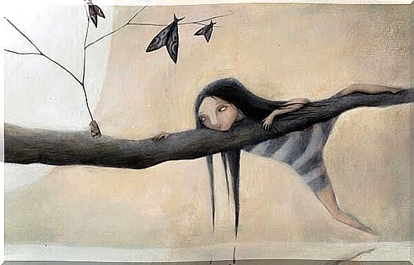 Little girl on a tree