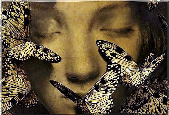 Woman with closed eyes surrounded by butterflies