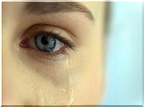 Eye of a woman with a tear to represent maladaptive emotions